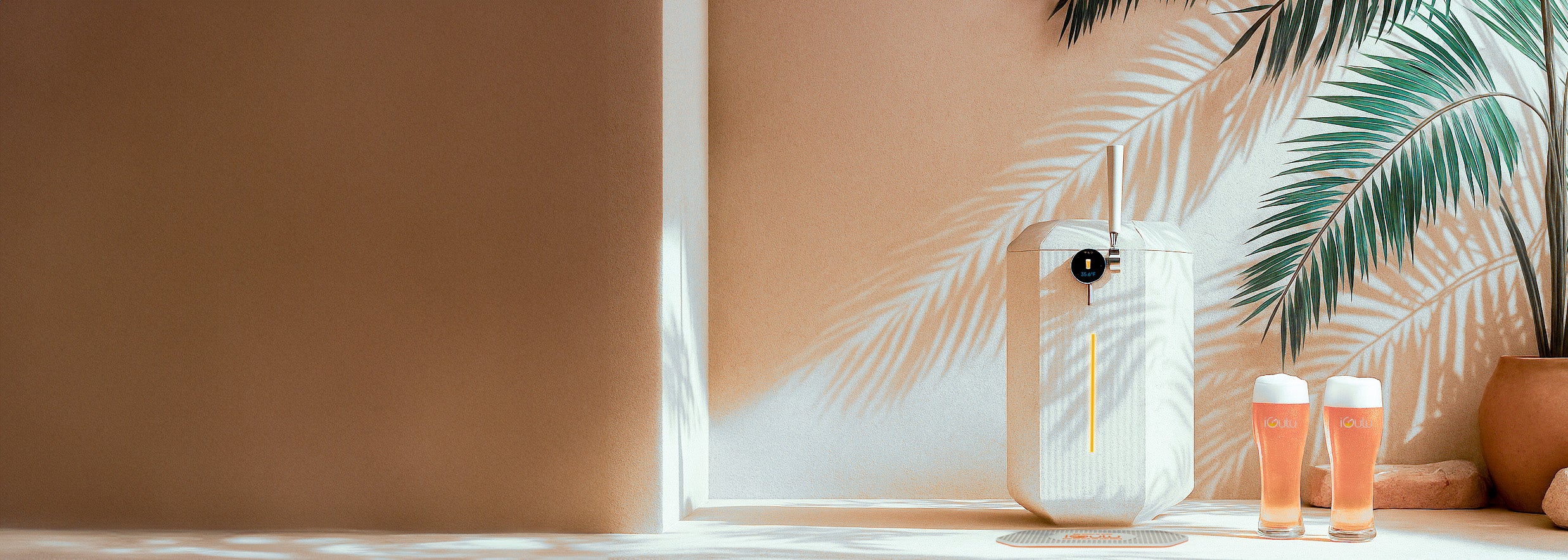 White iGulu F1 with two glasses of beer on a surface with palm leaves in the background